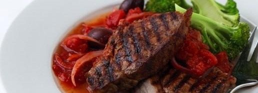 Beef steaks with tomato sauce